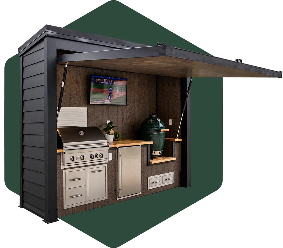 A Flamehouse with its door raised, showing the grill, ceramic egg, fridge, TV and storage